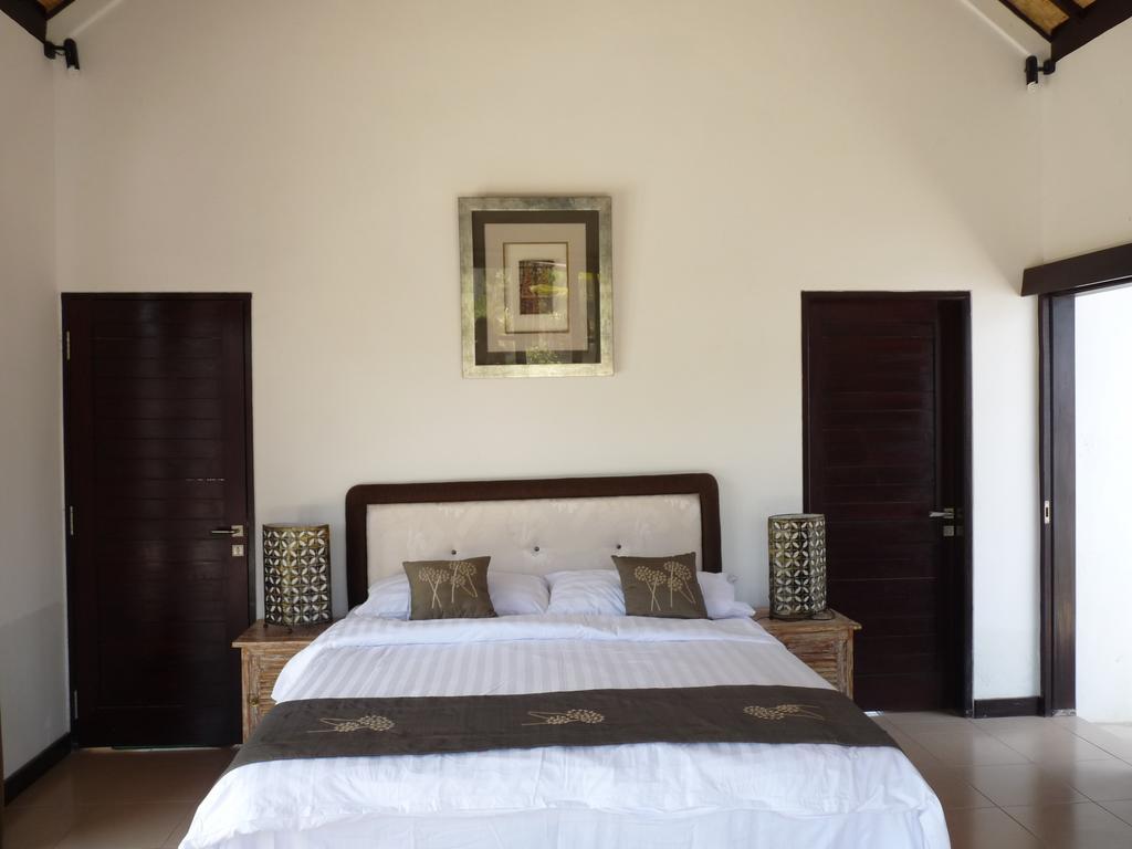 Taman Dewi Sri Villa et Bungalow Pemuteran Zimmer foto