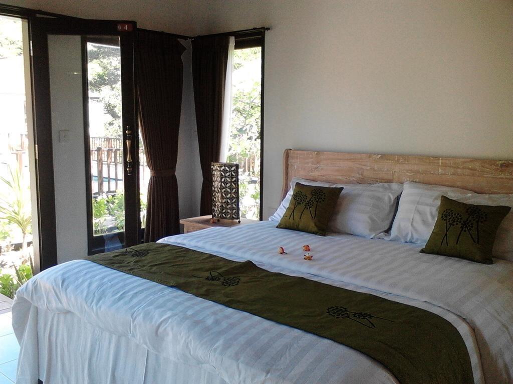 Taman Dewi Sri Villa et Bungalow Pemuteran Zimmer foto